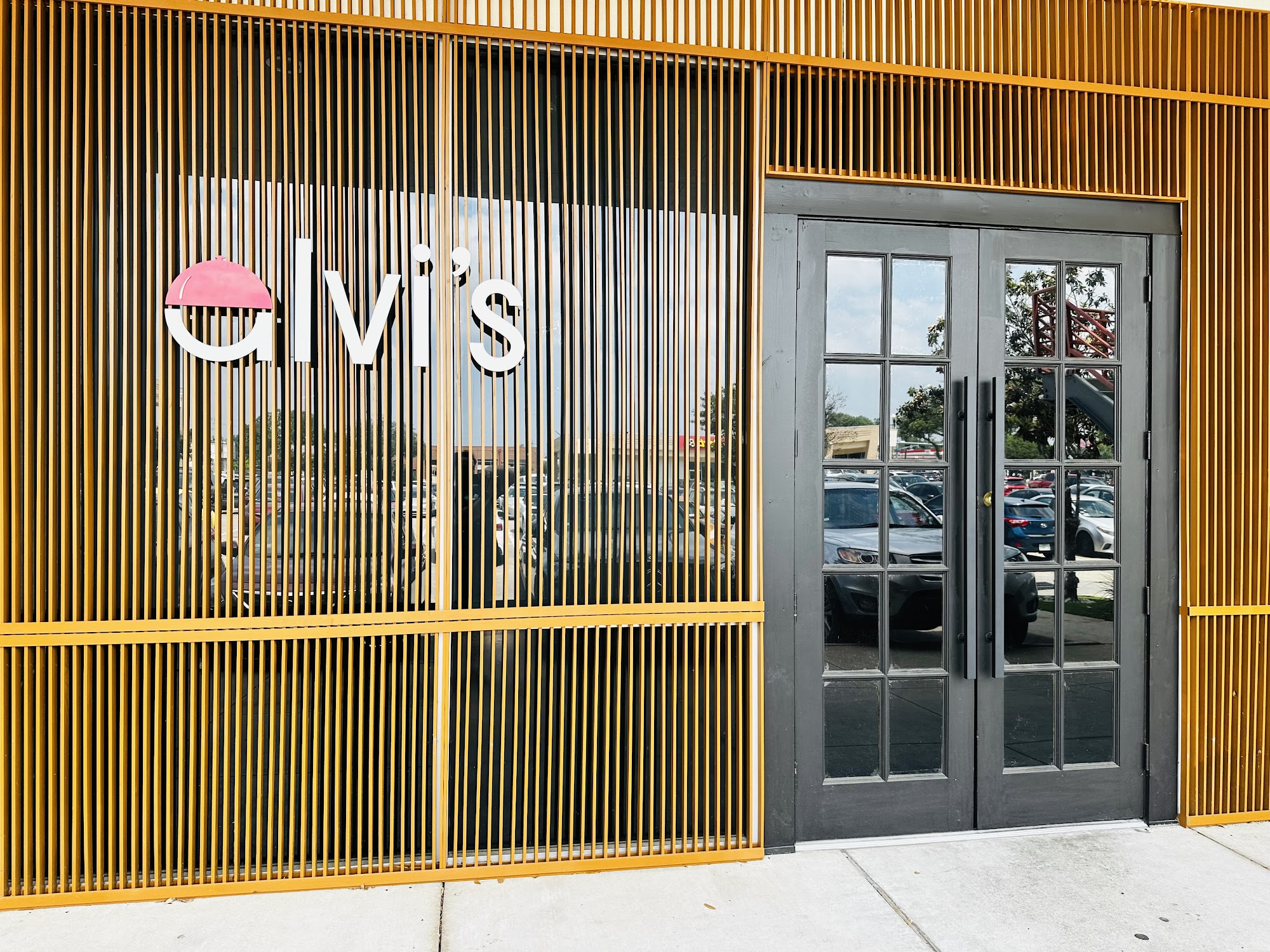 Alvi's Kitchen & Catering — storefront signage and slat screens